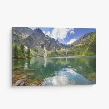 Leinwandbild ruhiger smaragdgrüner bergsee vor schroffen gipfeln – Pixers®