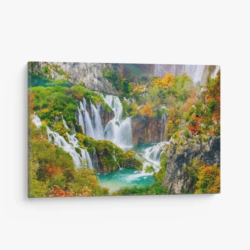 Leinwandbild türkisfarbener wasserfall im herbst