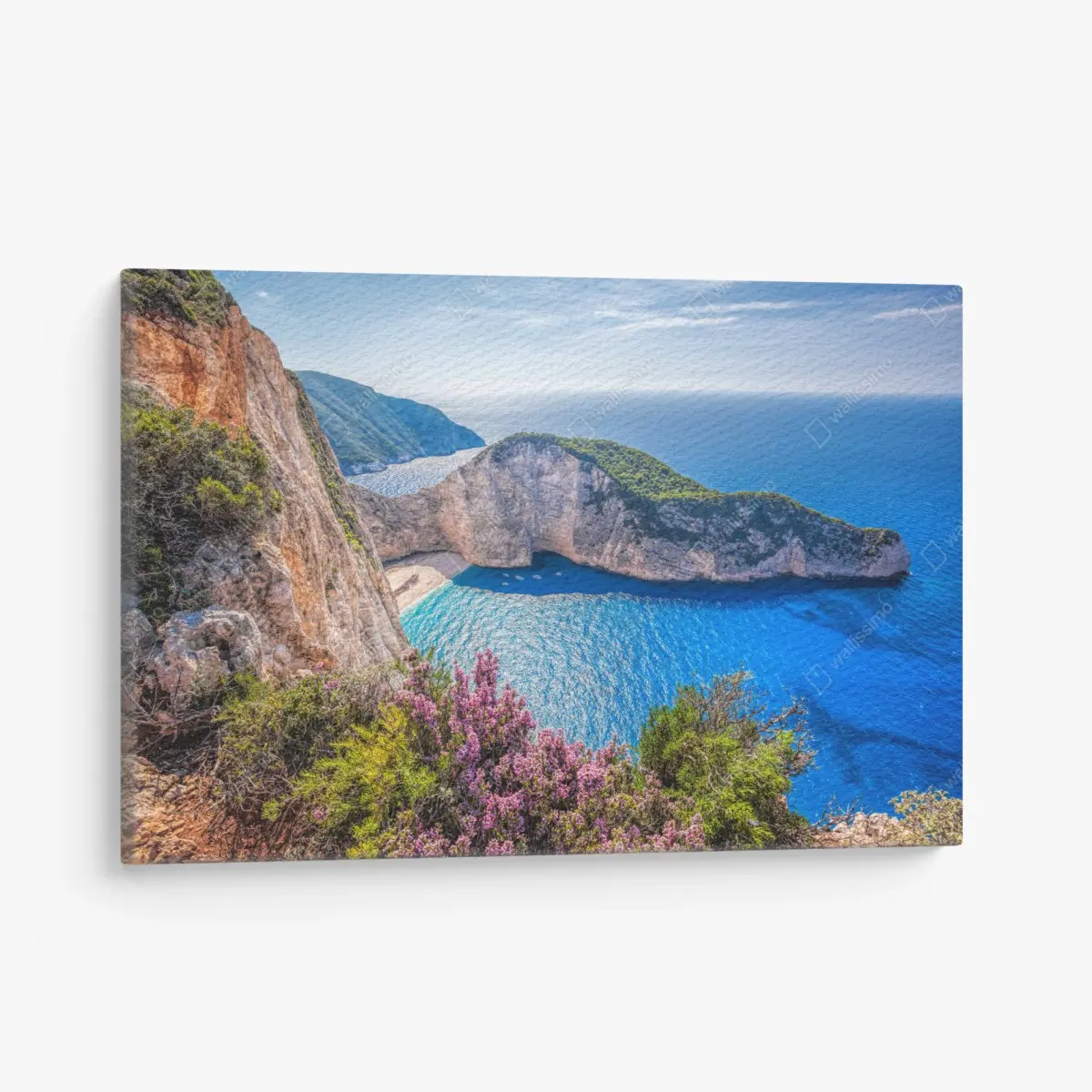 Leinwandbild Navagio strand sonnenuntergang mit türkisblauem meer und wildblumen – Pixers®