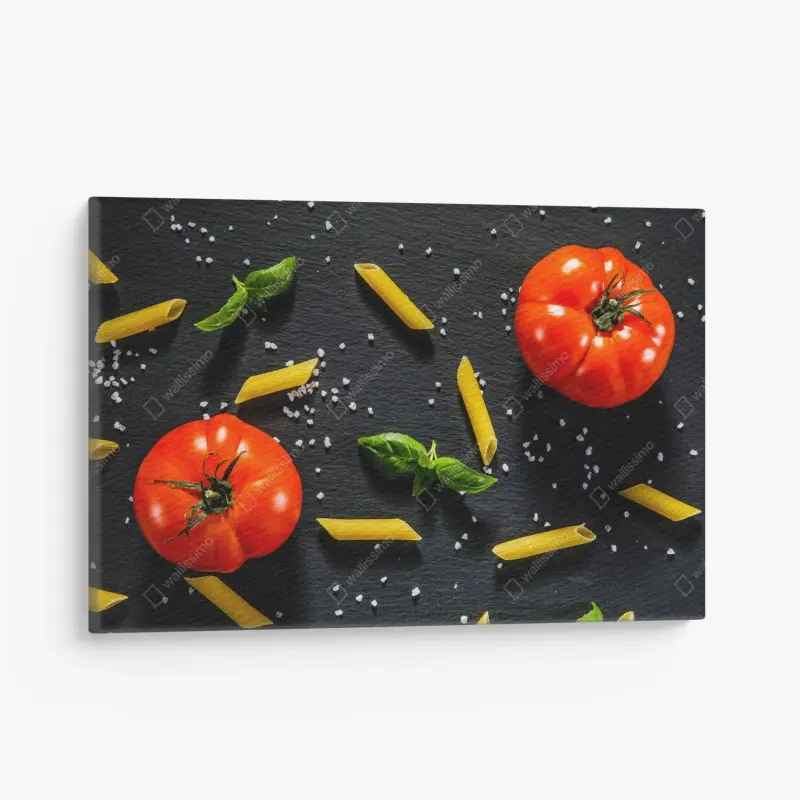 Leinwandbild tomaten und penne auf schwarzem schiefer