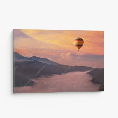 Leinwandbild heißluftballon über nebligen bergen bei sonnenaufgang – Pixers®