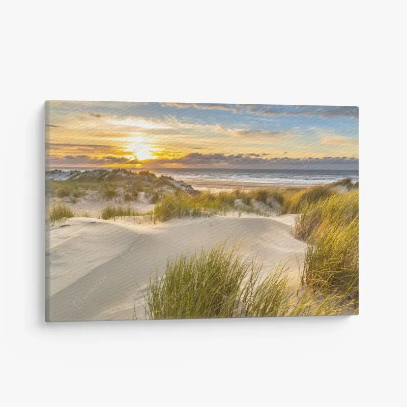 Leinwandbild sonnenuntergang über den dünen von Ameland
