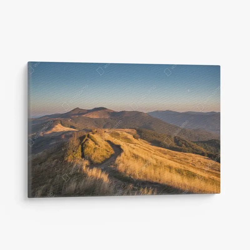 Leinwandbild goldener bergrücken bei sonnenuntergang