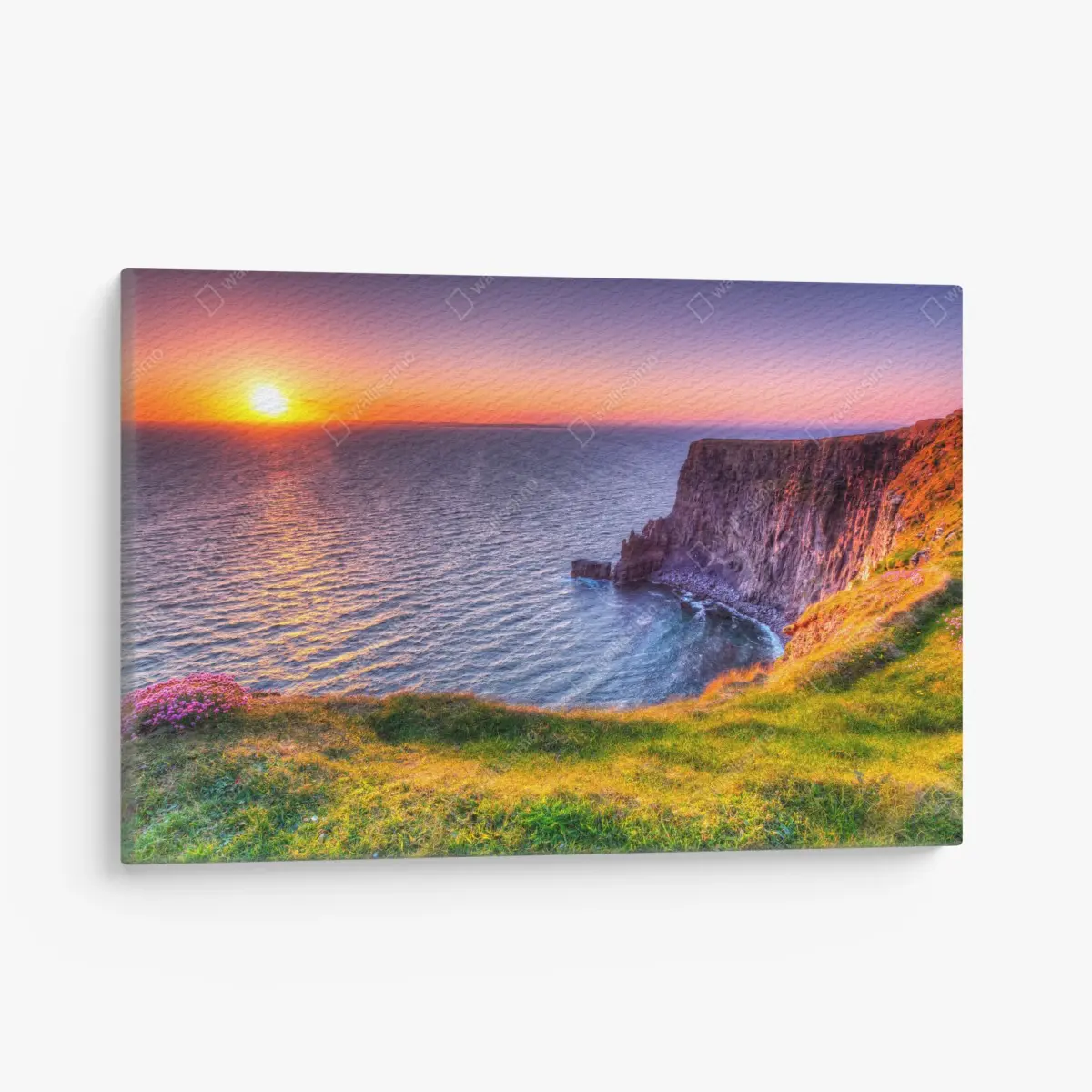 Leinwandbild sonnenuntergang über zerklüfteten küstenklippen – Pixers®