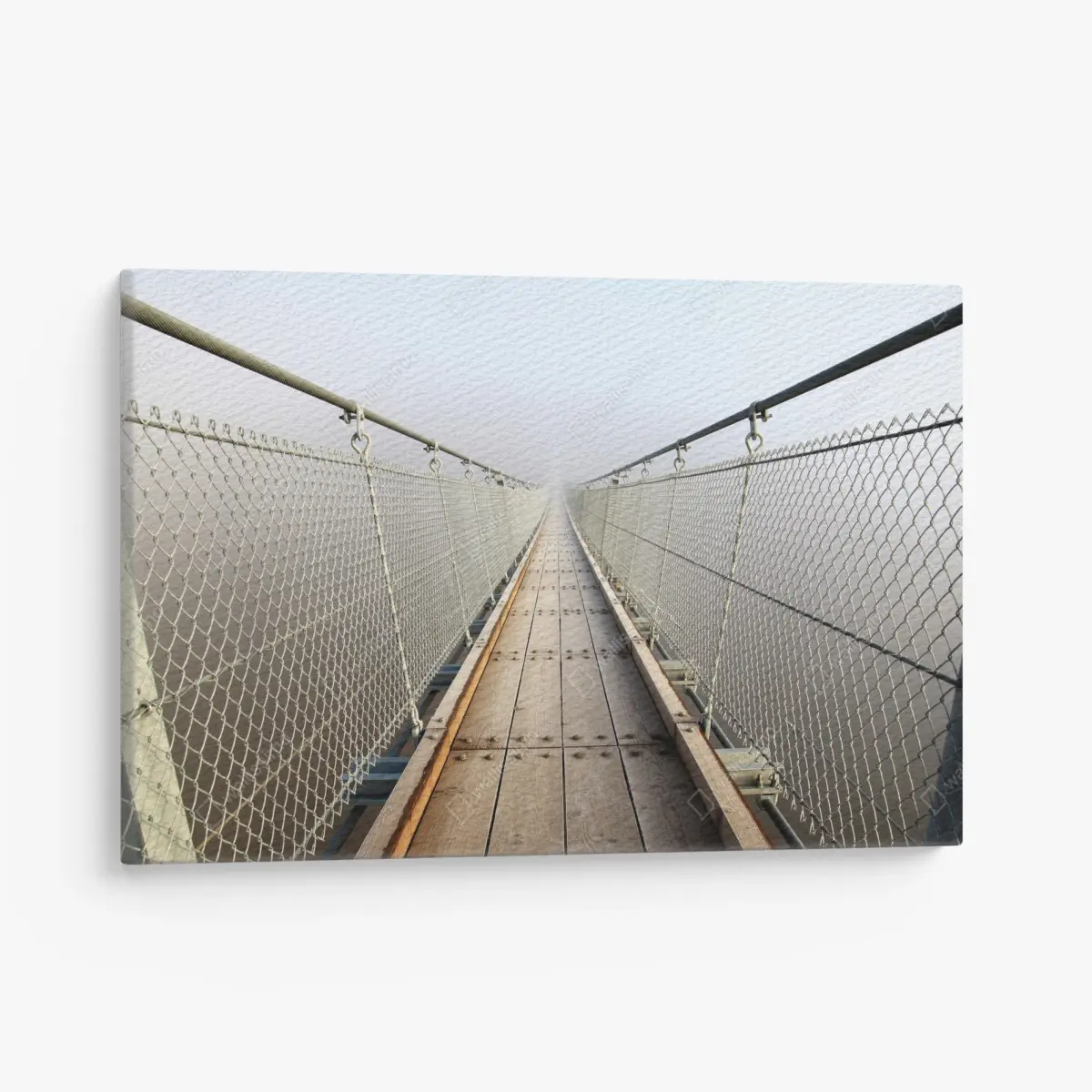 Leinwandbild neblige hängebrücke die in den nebel führt – Pixers®