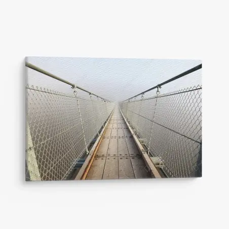 Leinwandbild neblige hängebrücke die in den nebel führt – Pixers®