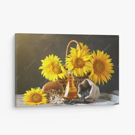 Leinwandbild leuchtendes stillleben mit sonnenblumen, kernen und öl – Pixers®