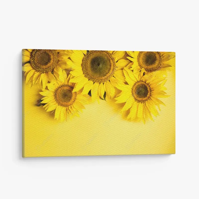 Leinwandbild leuchtender sonnenblumenstrauß auf gelbem hintergrund