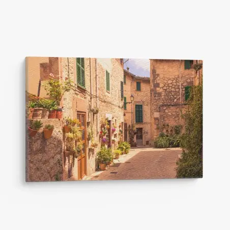 Leinwandbild sonnige mediterrane gasse mit blumentöpfen – Pixers®