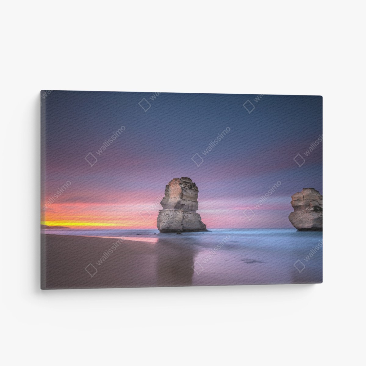 Leinwandbild ruhige küstenlandschaft mit felsformationen bei sonnenuntergang – Pixers®