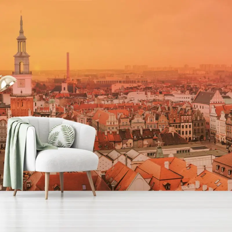 Fototapete warmer sonnenuntergang über historischen stadtdächern