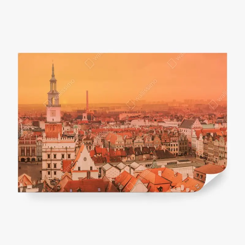 Fototapete warmer sonnenuntergang über historischen stadtdächern