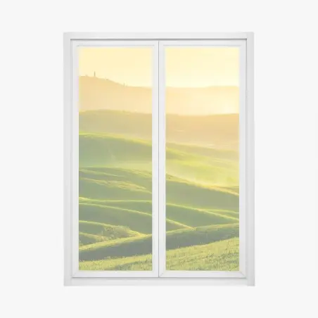 Fensteraufkleber goldener sonnenaufgang über sanften grünen hügeln – Pixers®