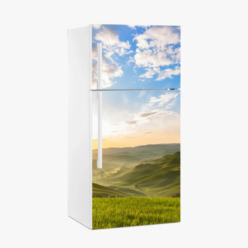 Kühlschrankaufkleber sonnenaufgang über nebligen hügeln