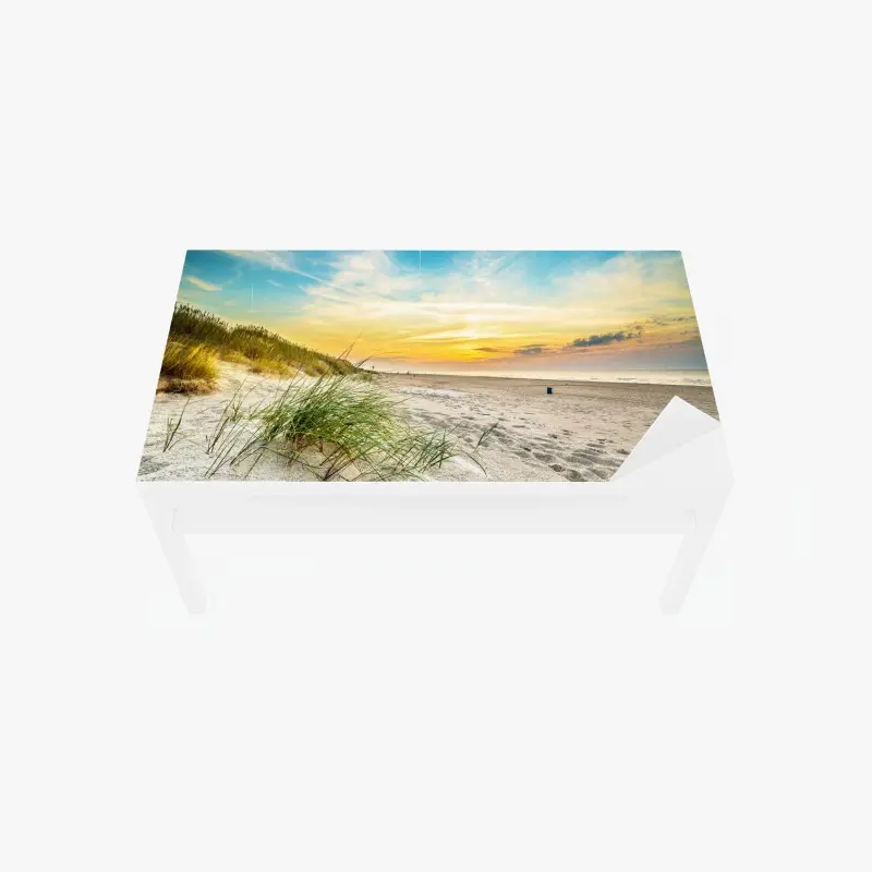Tischaufkleber und Schreibtischaufkleber sonnenuntergang über ruhigen dünen