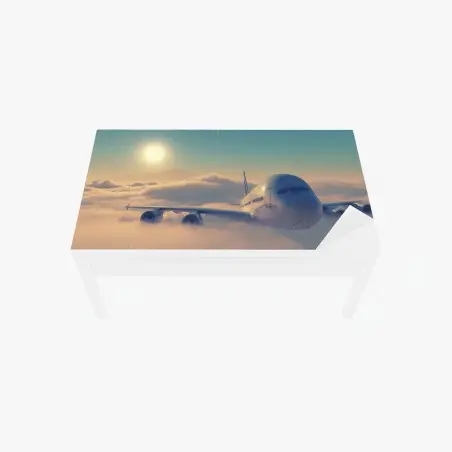 Tischaufkleber und Schreibtischaufkleber flugzeug über den wolken im morgengrauen – Pixers®