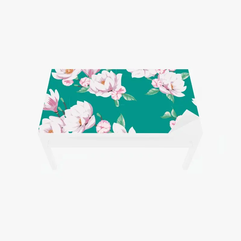 Tischaufkleber und Schreibtischaufkleber pastell magnolienmuster auf türkisfarbenem hintergrund
