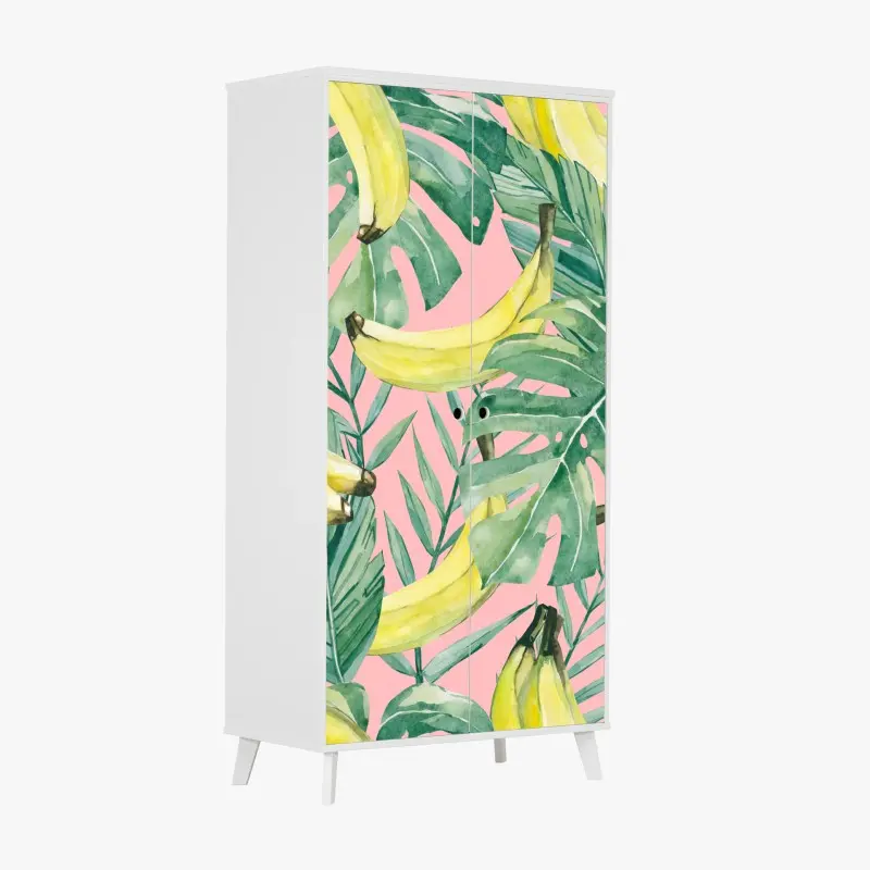 Schrankaufkleber aquarell-bananen und blättermuster auf rosa hintergrund