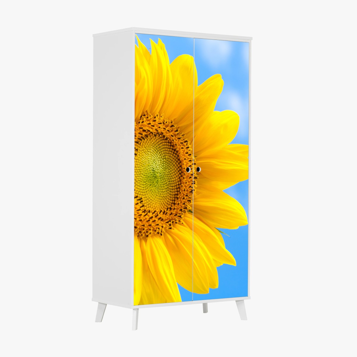 Schrankaufkleber leuchtende sonnenblume vor blauem himmel – Pixers®