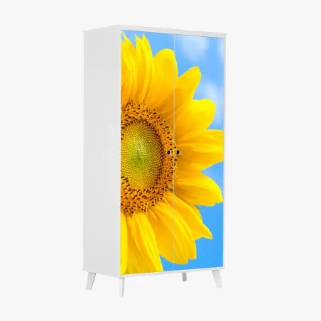 Schrankaufkleber leuchtende sonnenblume vor blauem himmel – Pixers®