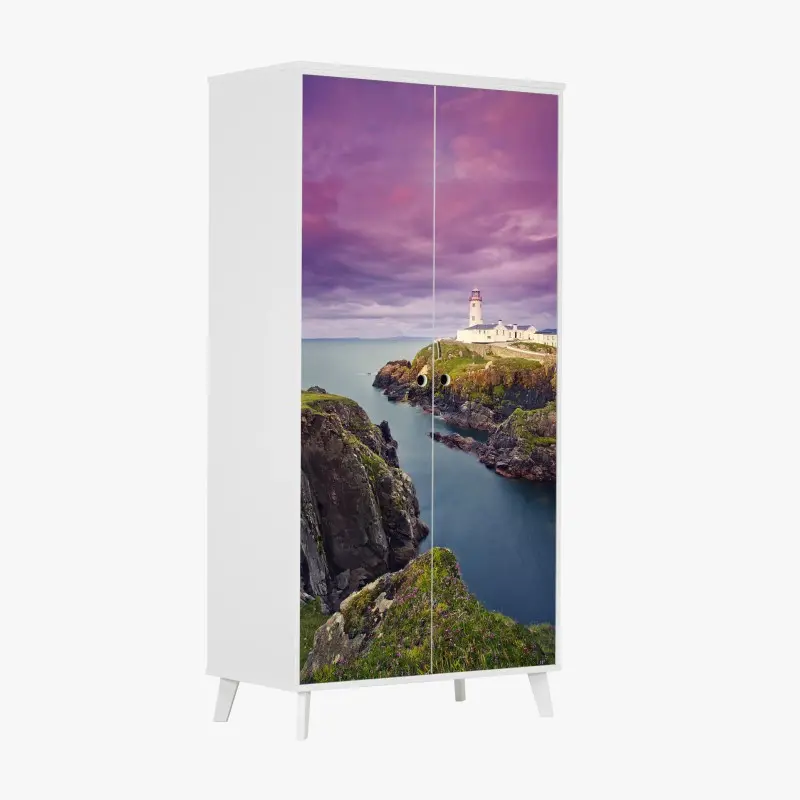 Schrankaufkleber lila leuchtturm an steiler küste