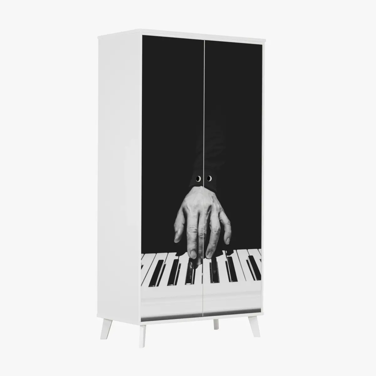 Schrankaufkleber monochromes nahaufnahme einer hand am klavier – Pixers®