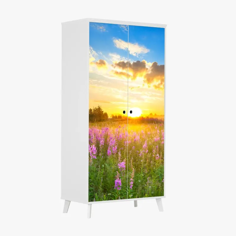Schrankaufkleber sonnenaufgang über violetter wildblumenwiese