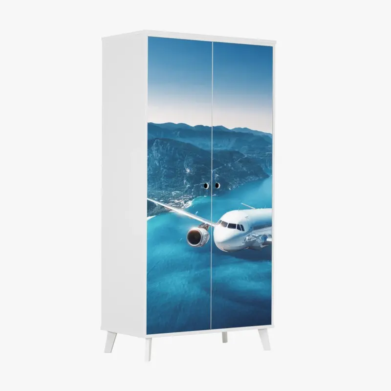 Schrankaufkleber küstenflug über türkisblauem meer