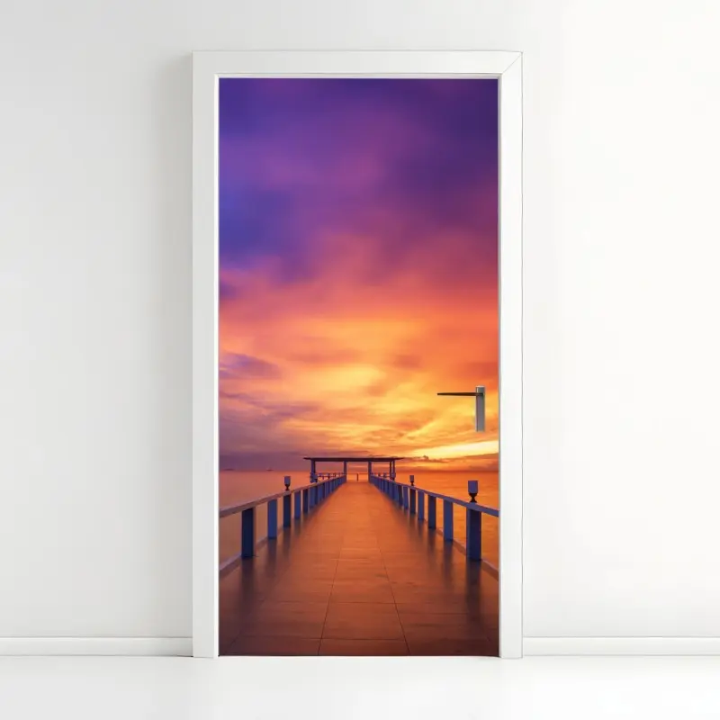 Türaufkleber sonnenuntergang am steg am strand