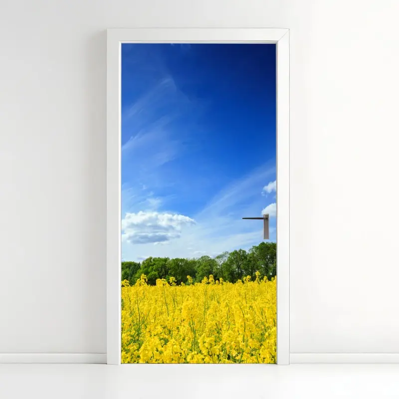 Türaufkleber polnisches rapsfeld unter blauem himmel