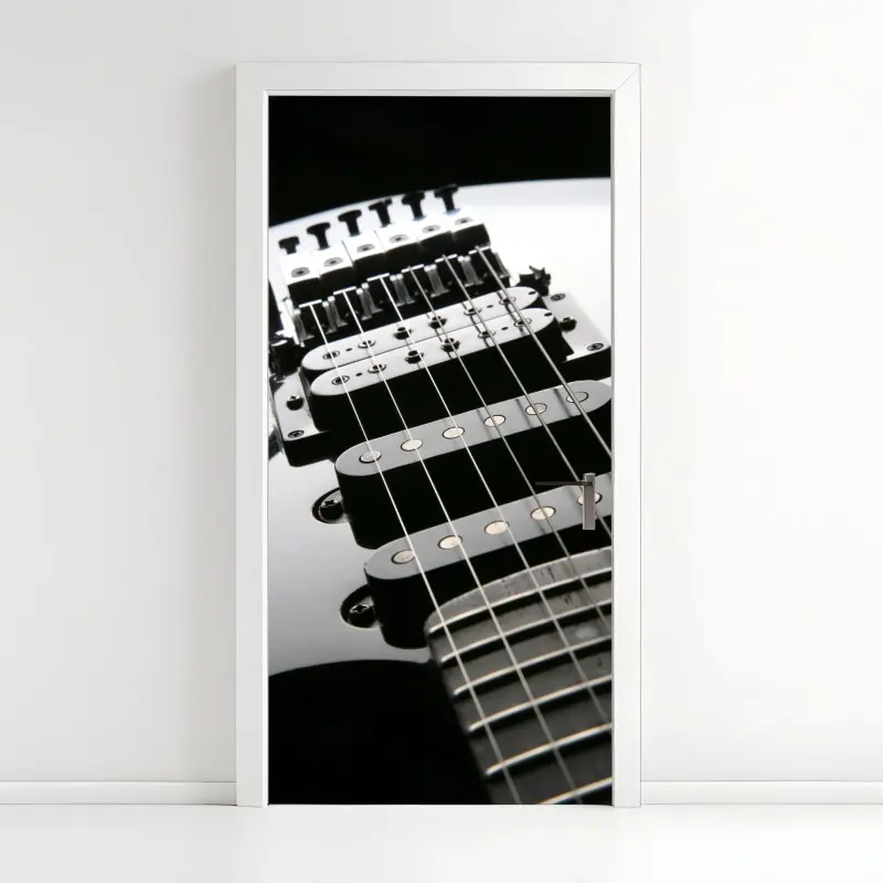 Türaufkleber nahaufnahme einer schwarzen elektrogitarre