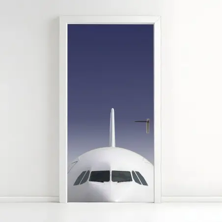 Türaufkleber frontansicht eines flugzeugs vor blauem himmel – Pixers®
