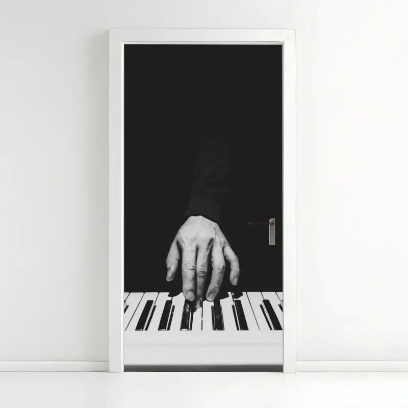 Türaufkleber monochromes nahaufnahme einer hand am klavier