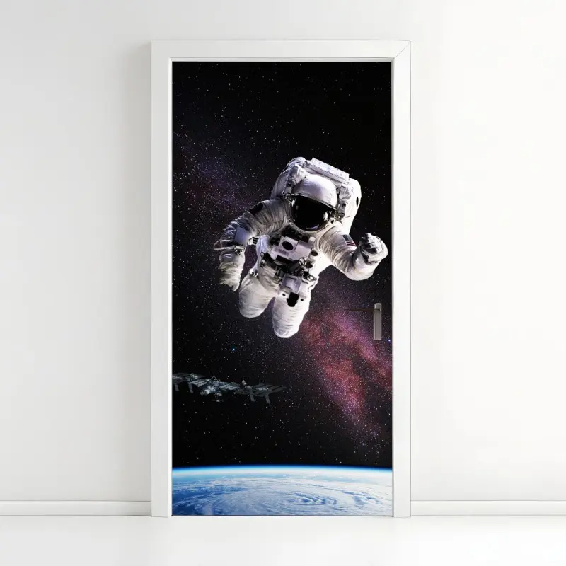 Türaufkleber astronaut über der Erde und galaxie