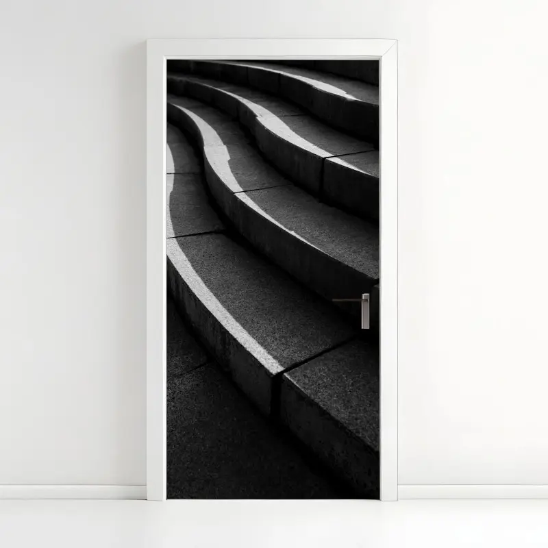 Türaufkleber geschwungene betontreppe im schatten