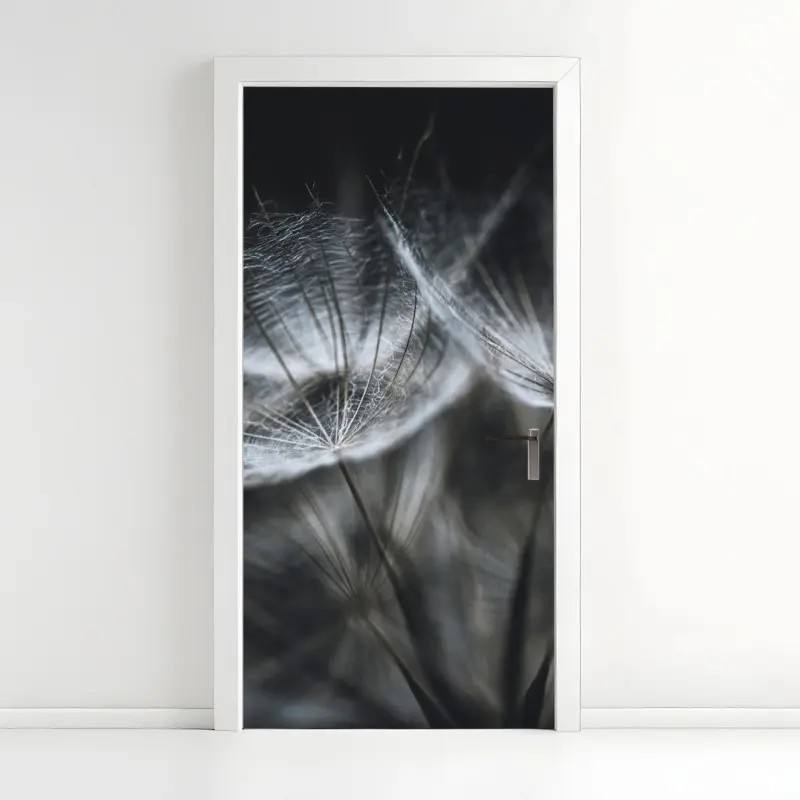 Türaufkleber zarte löwenzahnsamen in monochrom