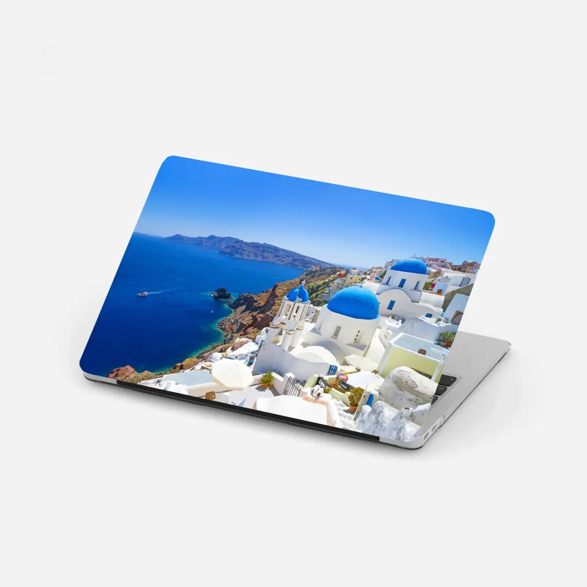 Laptop-Aufkleber Santorini blaue kuppeln über der kaldera – Pixers®