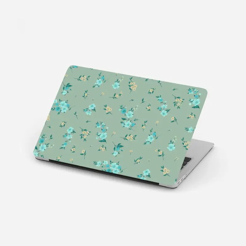 Laptop-Aufkleber pastell türkis blumenmuster auf salbeigrünem hintergrund
