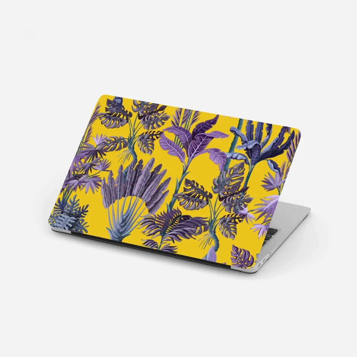 Laptop-Aufkleber tropische lila blätter auf gelbem hintergrund – Pixers®
