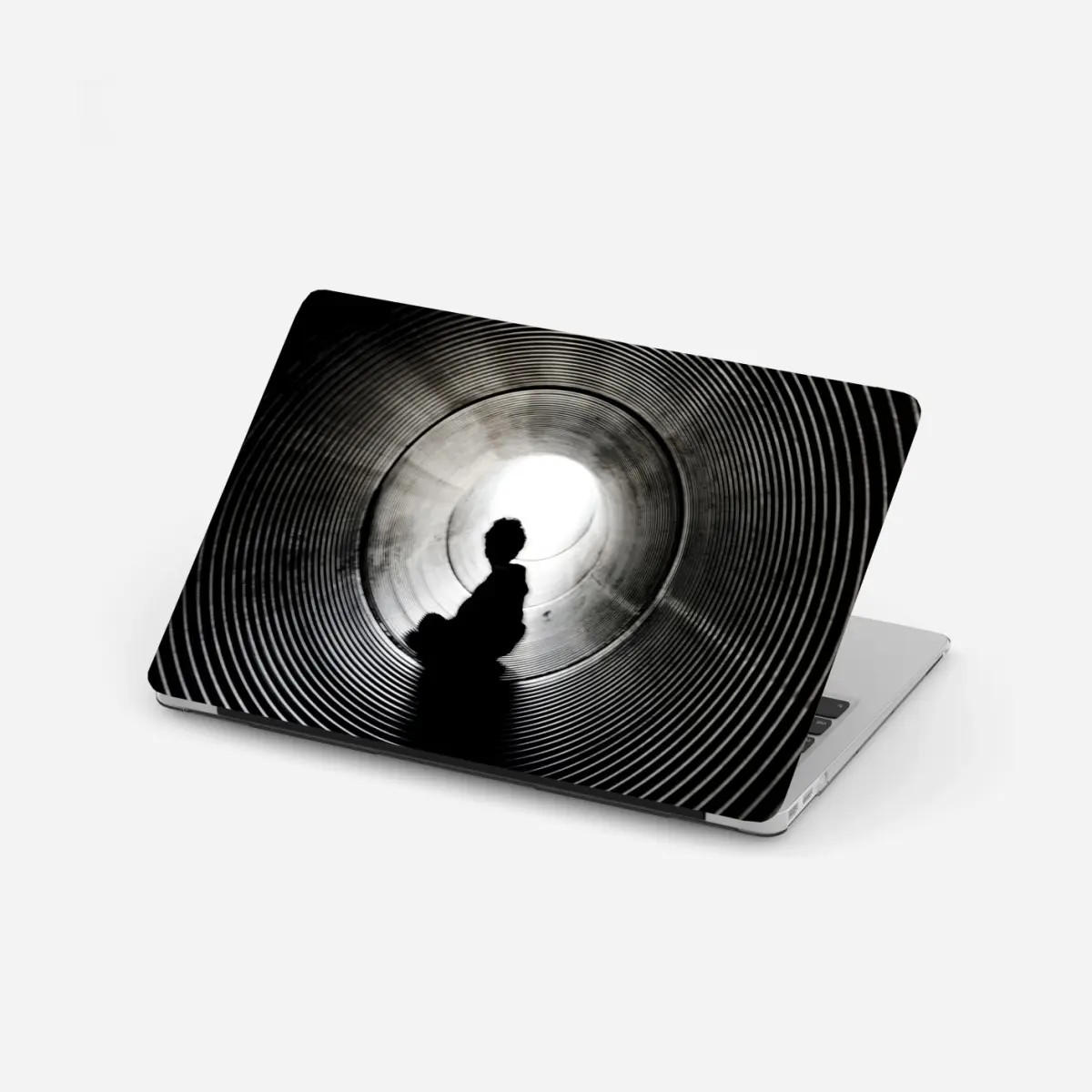 Laptop-Aufkleber silhouette in einem spiraltunnel – Pixers®