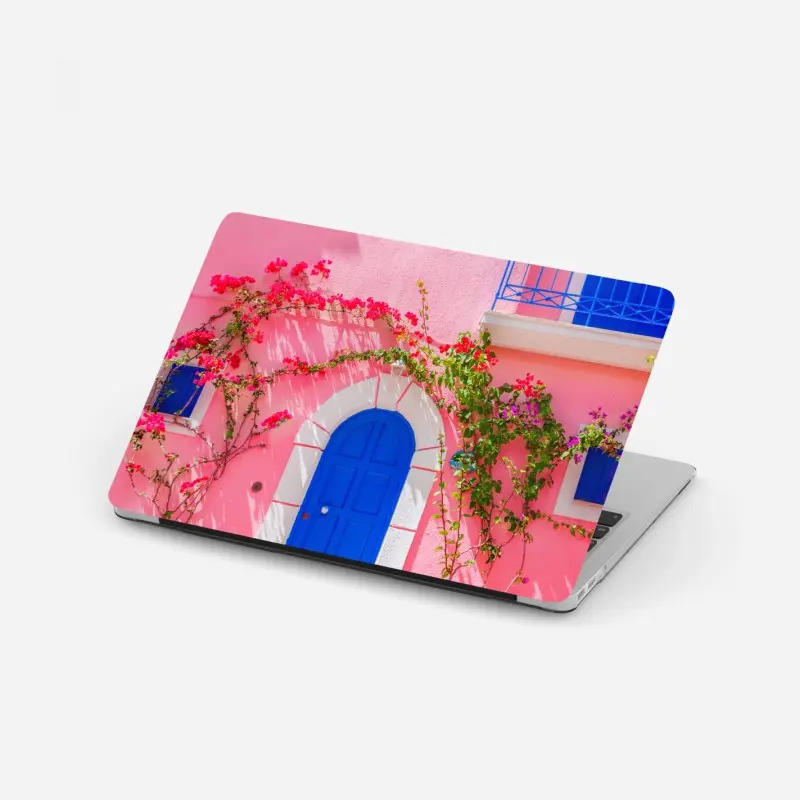 Laptop-Aufkleber leuchtende rosa fassade mit blauer tür