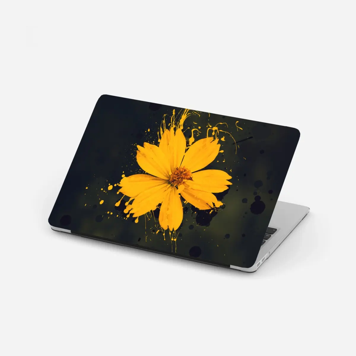 Laptop-Aufkleber leuchtende gelbe blüte auf dunklem hintergrund – Pixers®