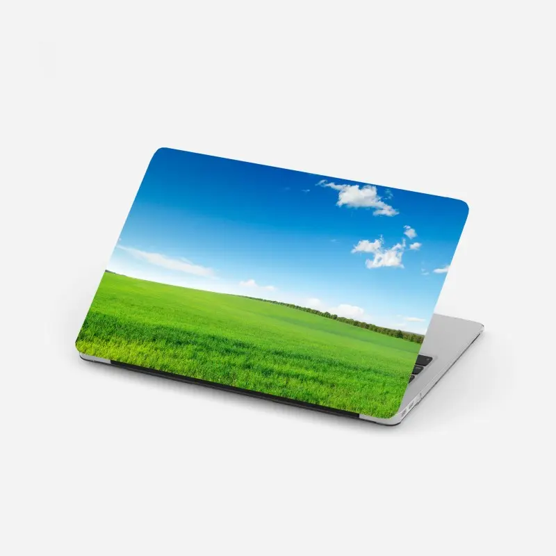 Laptop-Aufkleber ruhige grüne wiese unter blauem himmel