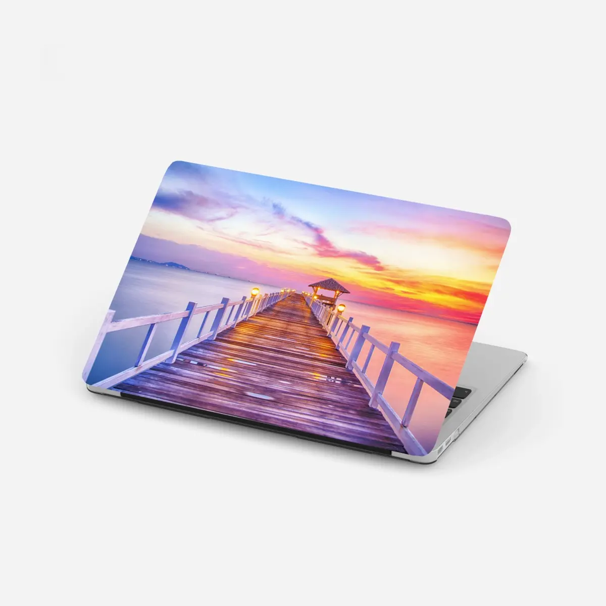 Laptop-Aufkleber sonnenuntergang am steg zum ruhigen horizont – Pixers®