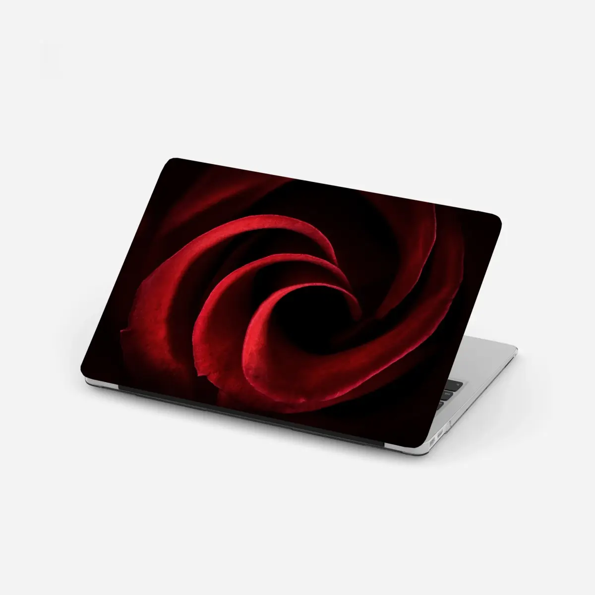 Laptop-Aufkleber spirale aus tiefroten rosenblättern – Pixers®