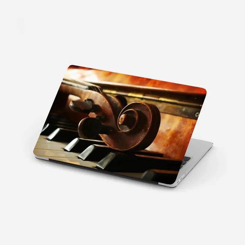 Laptop-Aufkleber vintage geigenkopf auf klaviertasten
