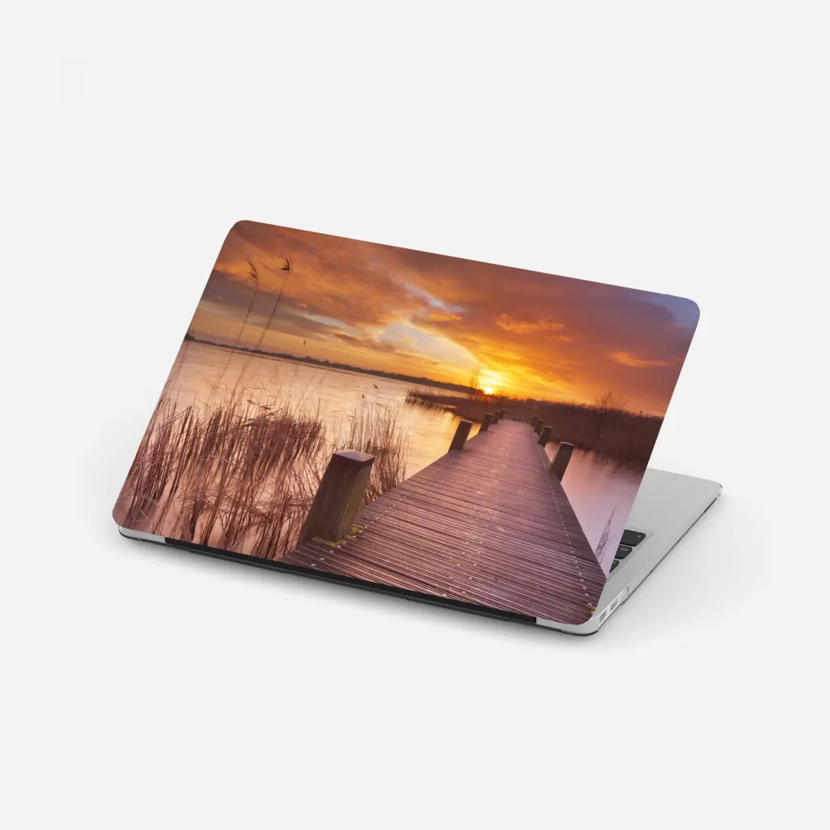 Laptop-Aufkleber sonnenaufgang über dem see bei Amsterdam – Pixers®