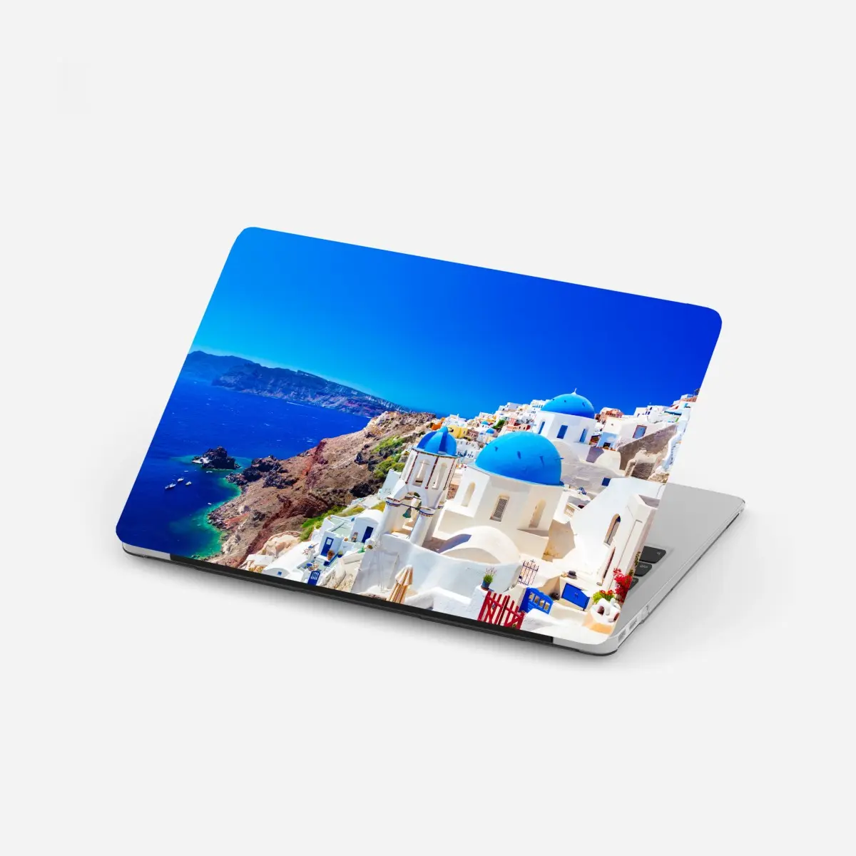 Laptop-Aufkleber Santorini blaue kuppeln über dem Ägäischen Meer – Pixers®