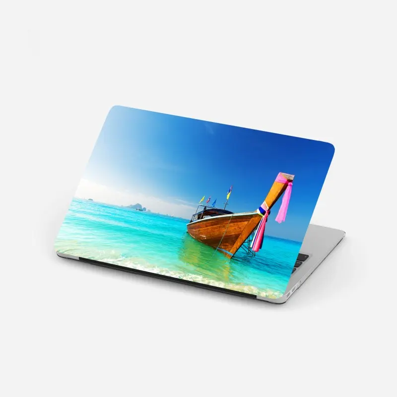 Laptop-Aufkleber langheckboot am türkisfarbenen strand, Andamanensee