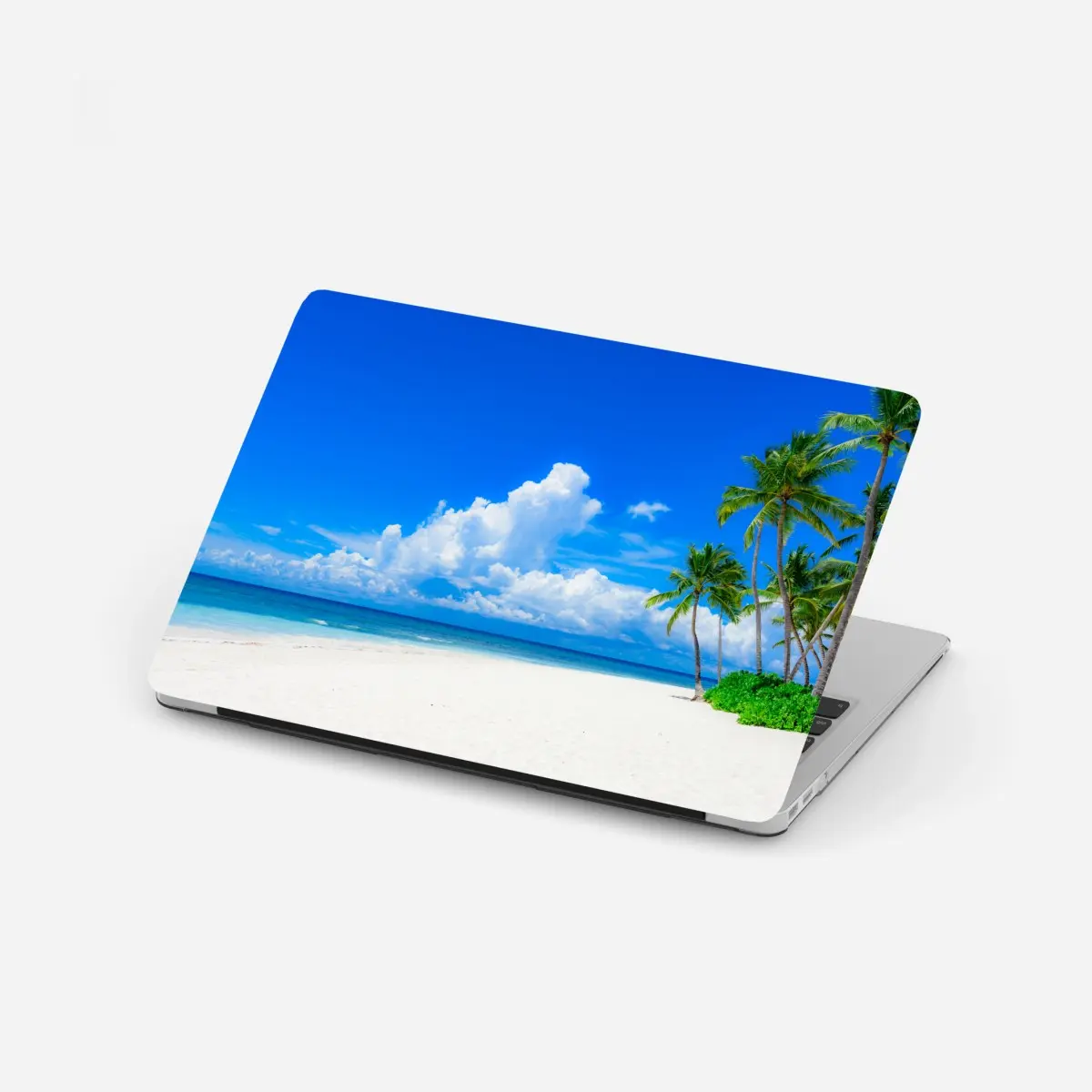 Laptop-Aufkleber tropischer palmenstrand unter blauem himmel – Pixers®